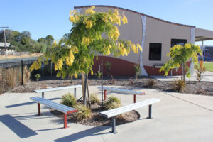 Bolt Down Benches powder coated in Colorbond Manor Red and Woodland Grey